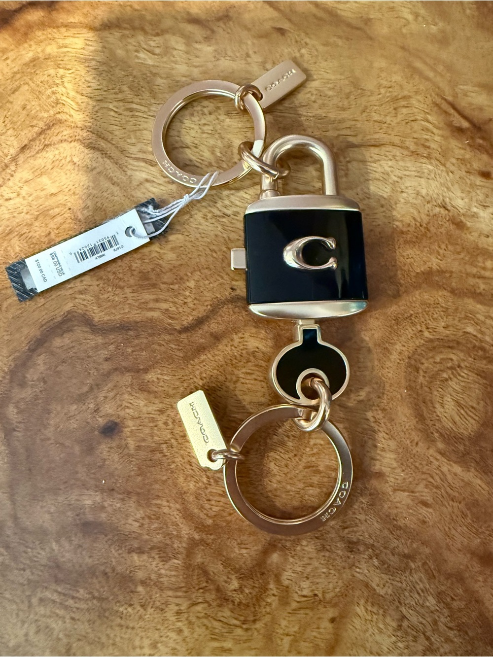 Coach Black and Gold Lock Charm Keyring